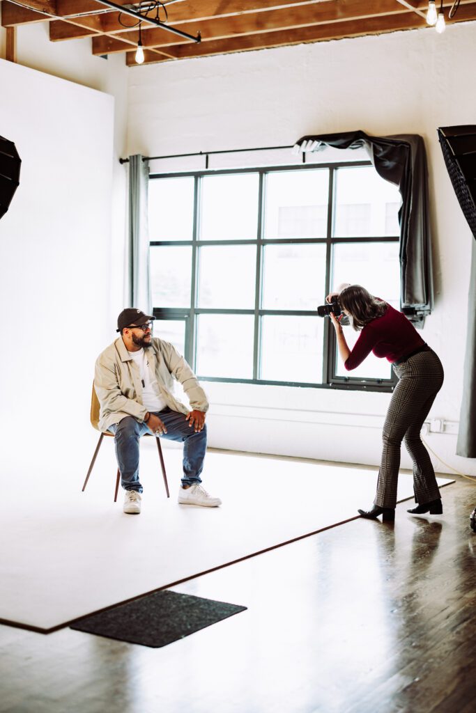 busy entrepreneur enjoying easy brand shoot in photography studio setting