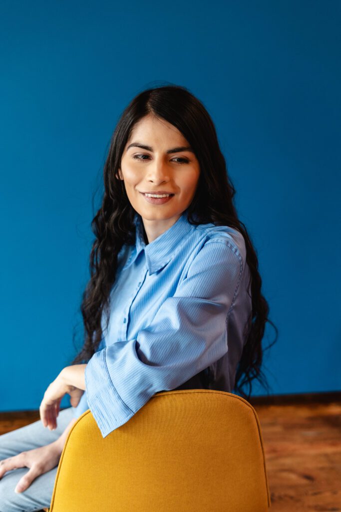 Soft studio lighting and open smile—perfect for building approachable personal brand visuals