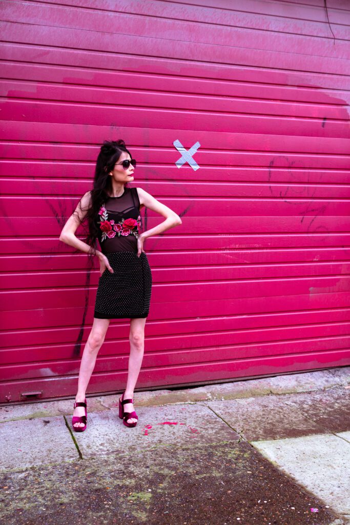 High-contrast brand photo styled for creative professionals, photographed against Portland architecture.