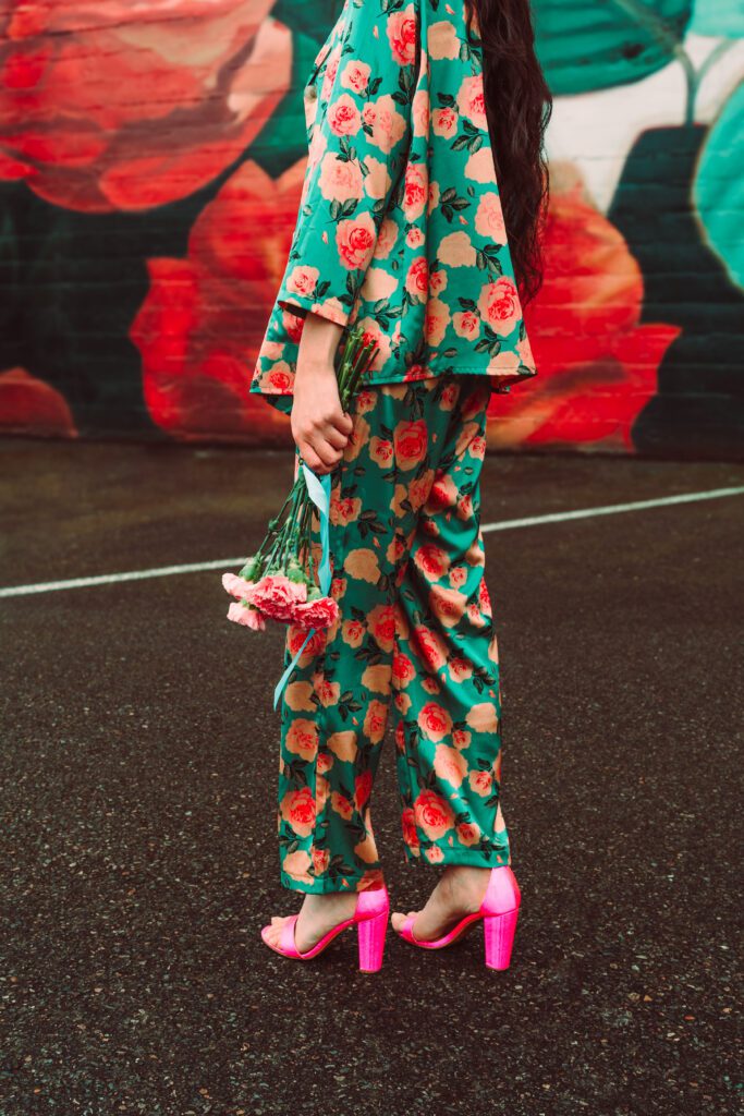 Close-up of a creative two-piece set and pink heels—editorial details for brand storytelling.