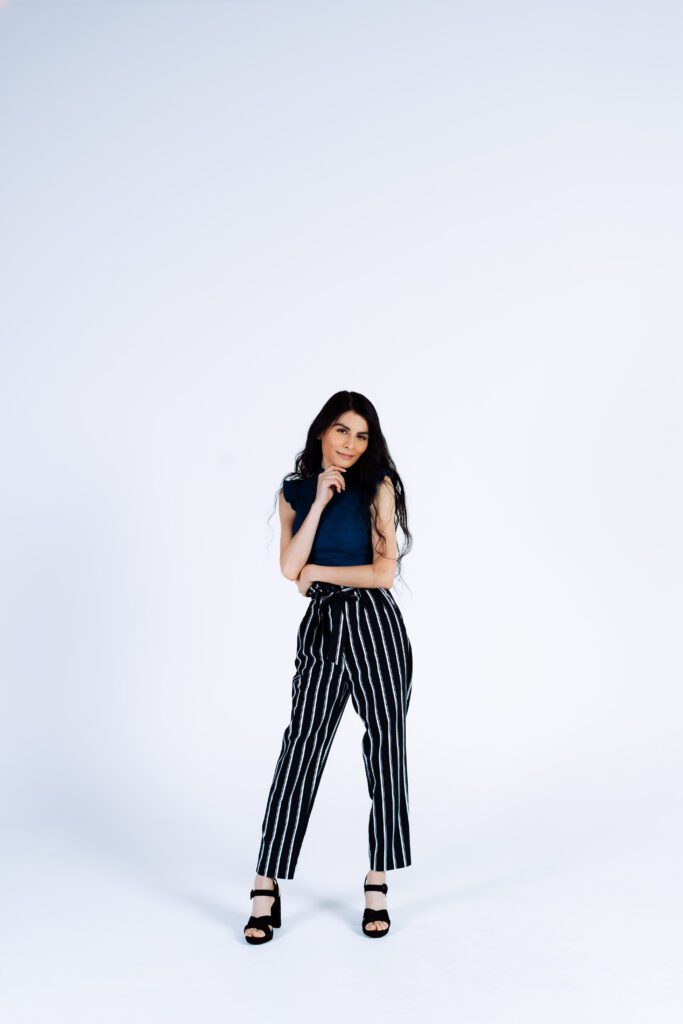 Personal branding photo in a minimalist white studio, perfect for commercial portfolios and creative professionals in Portland.