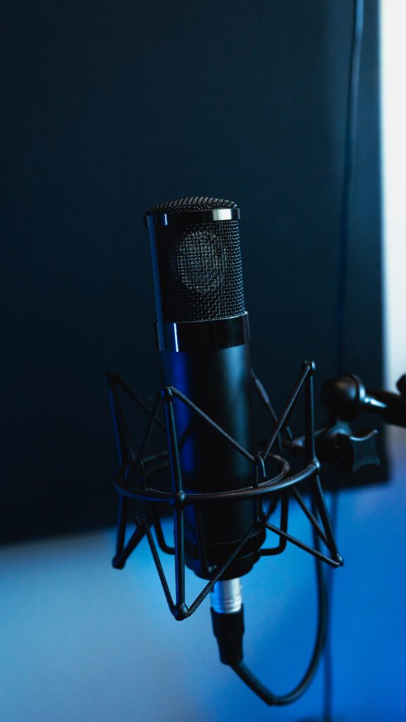 Condenser mic setup with blue background for modern recording sessions