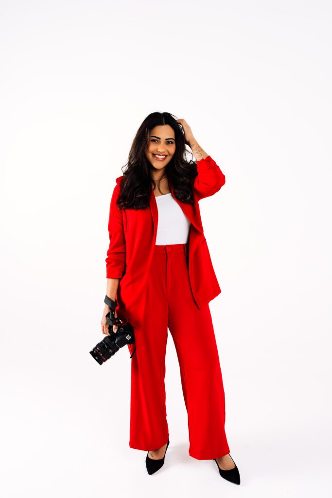 bold brand shoot with red outfit and confident smiling pose
