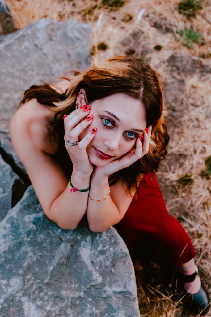 expressive close-up of artist with creative makeup and intense eye contact